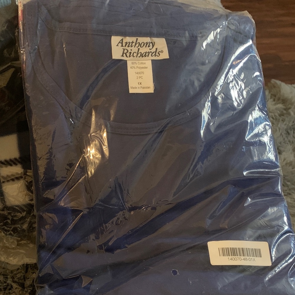 Anthony Richards Women's Classic Royal Blue Top and plaid bottom pajamas set.